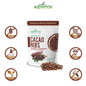 Alovitox cacao nibs on a spoon, showing a crunchy, low-sugar snack option.