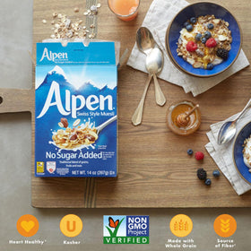 Alpen Muesli No Sugar Added bowl with milk and fresh fruit.