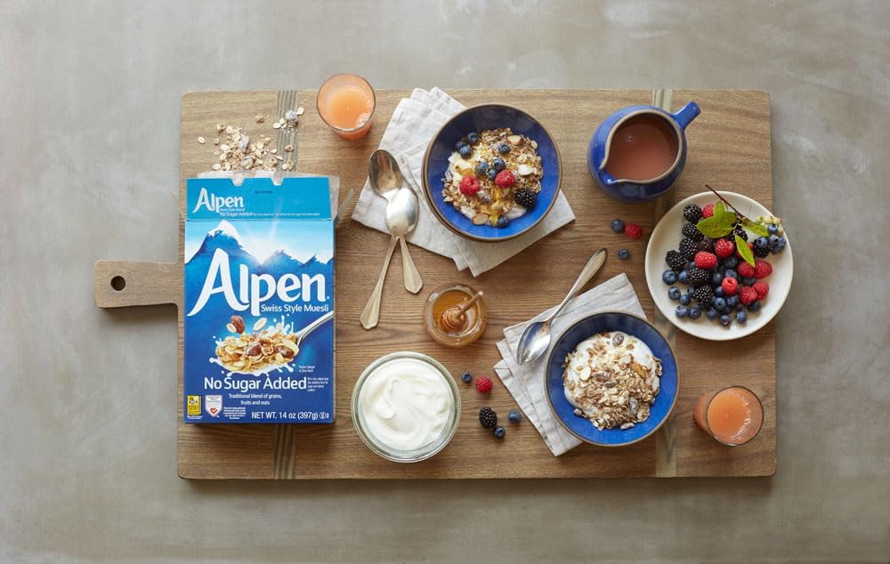 Alpen Muesli No Sugar Added ingredients arranged: wheat flakes, oats, nuts, raisins.