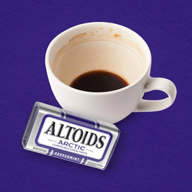 Stacked ALTOIDS Arctic peppermint tins showcasing compact bulk packaging