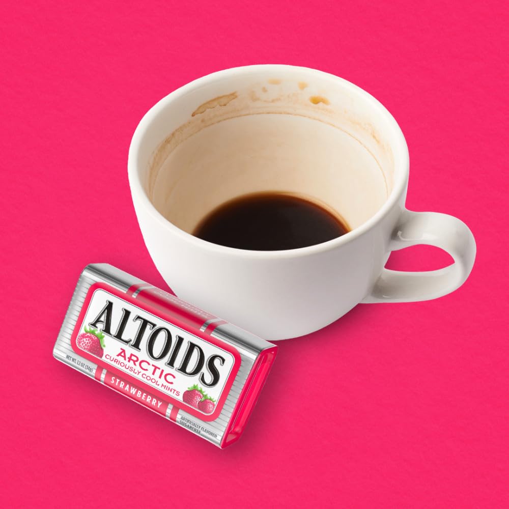 ALTOIDS Arctic Strawberry mints in car for travel freshness.