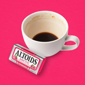 ALTOIDS Arctic Strawberry mints in car for travel freshness.