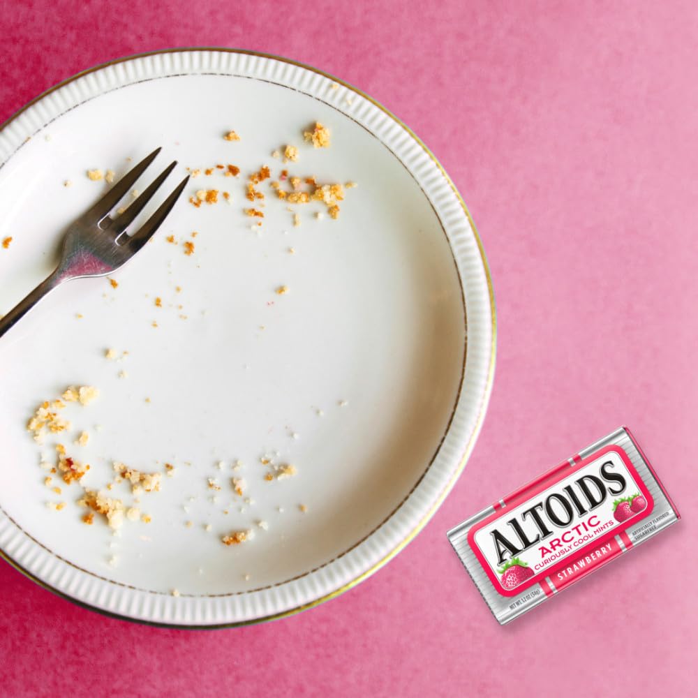 ALTOIDS Arctic Strawberry tin on a desk for instant breath confidence.