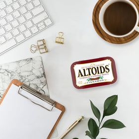 Packaging and brand label of Altoids Cinnamon mints emphasizing heritage and flavor.