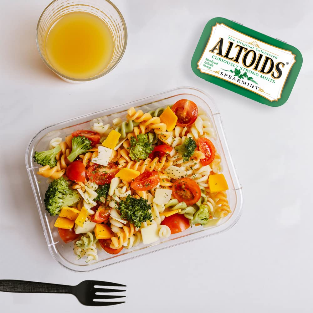 Altoids Spearmint tins in pack show twelve-count convenience for sharing or personal use.