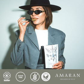 AMARAN Organic Amaranth Wafer Thins on a coffee break setup for on-the-go snacking.