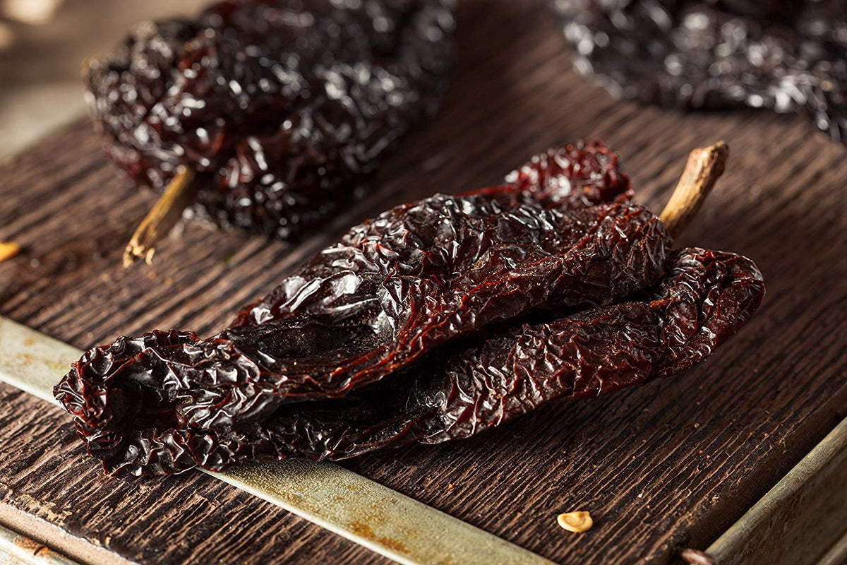 Amazing Chiles & Spices ancho powder sauce simmer adding depth and smokiness.
