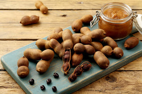 Amazing Chiles & Spices dried tamarind fruit close-up suitable for chutneys, candies, and sauces.