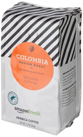 Amazon Fresh Colombia ground coffee bag closeup highlighting fresh aroma and 100% Arabica quality.