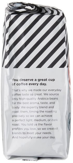 Amazon Fresh Colombia ground coffee beans image suggesting rich body for drip brewing.