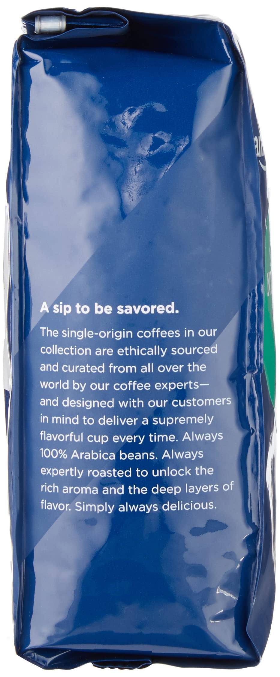 Amazon Fresh coffee bag closeup shows premium whole beans ready to grind.