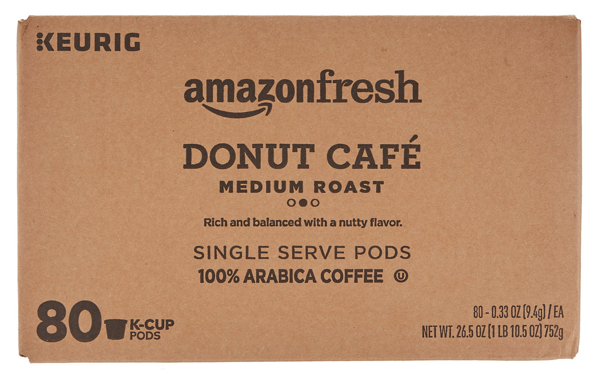 Close-up of Donut Café pods highlighting premium Arabica beans for balanced flavor.