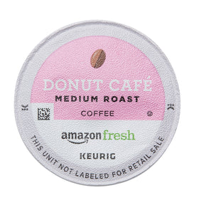Steaming cup of Donut Café with inviting aroma.