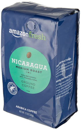 Amazon Fresh ground coffee bags twelve ounces for quick, convenient brewing.