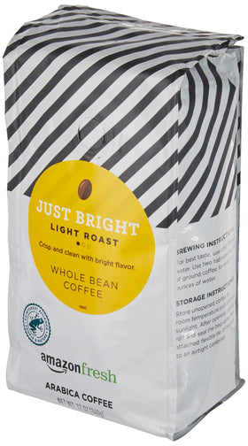 AmazonFresh Just Bright whole beans closeup showing 100 percent Arabica quality.