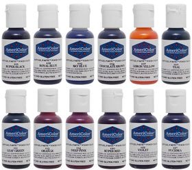Close-up of AmeriColor Student Kit bottles showing strong coloring power for bold results.