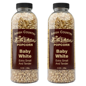 Amish Country Popcorn bottle front with baby white kernels, convenient snack option.