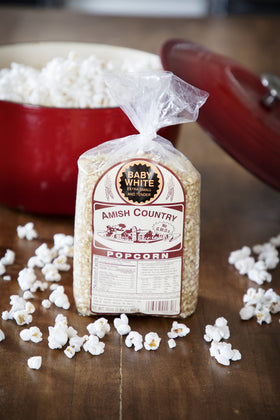 Amish Country Popcorn bag front view highlighting GMO-free wholesome snack option