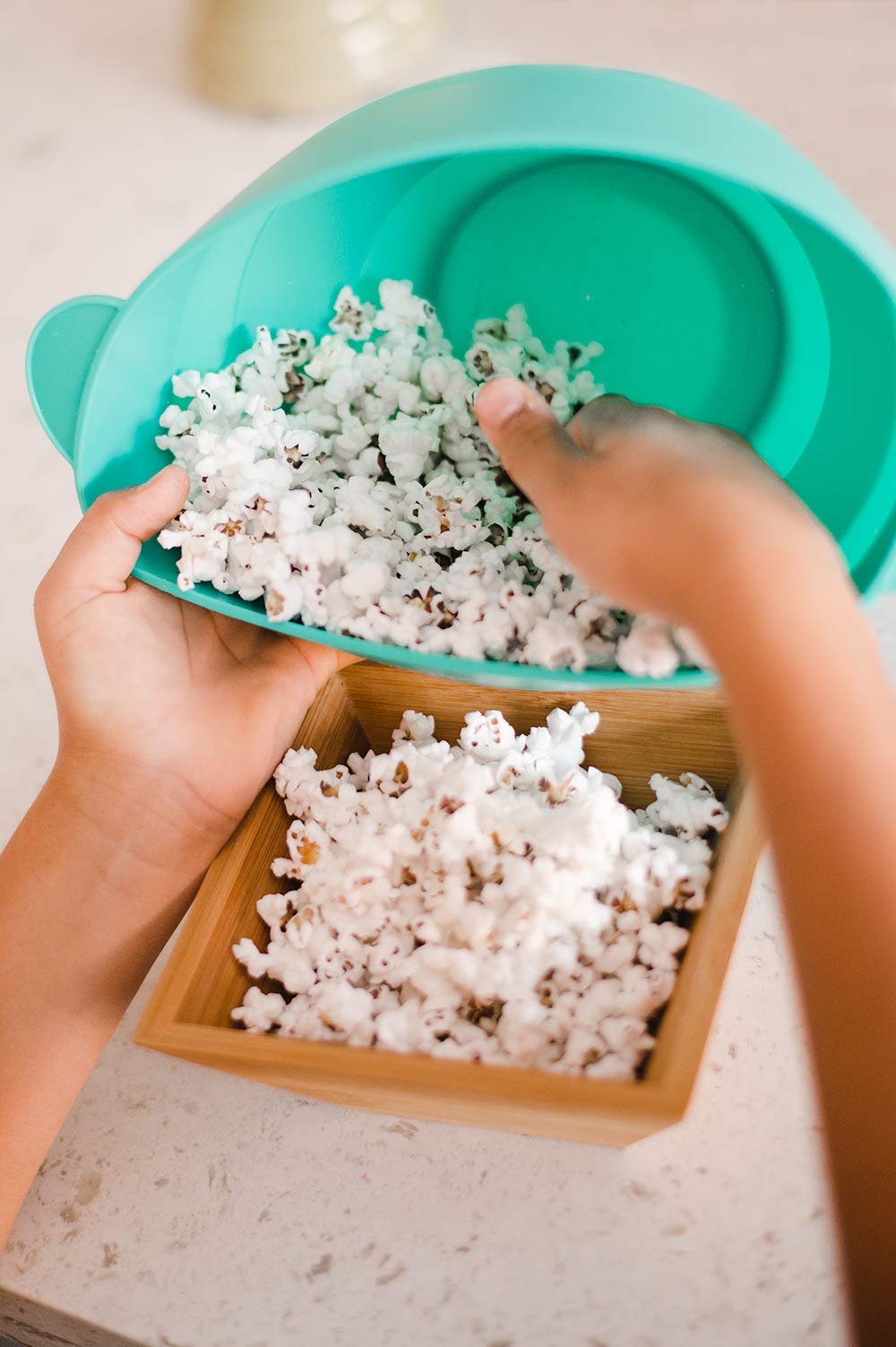 Amish Country Popcorn bag being popped for a cozy movie night.