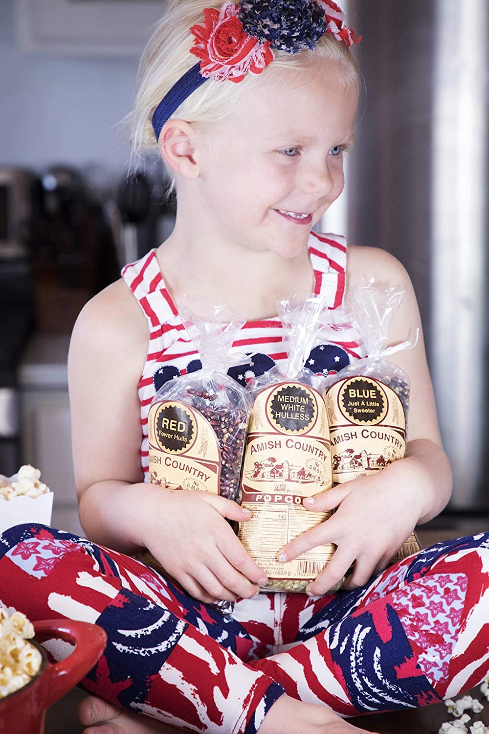 Amish Country Popcorn blue kernel bag ready for festive snacking.