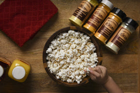 Amish Country Popcorn bowl with toppings ready for a snack.