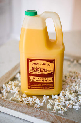 Gallon container of Amish Country Popcorn Buttery Topping ready for refills.