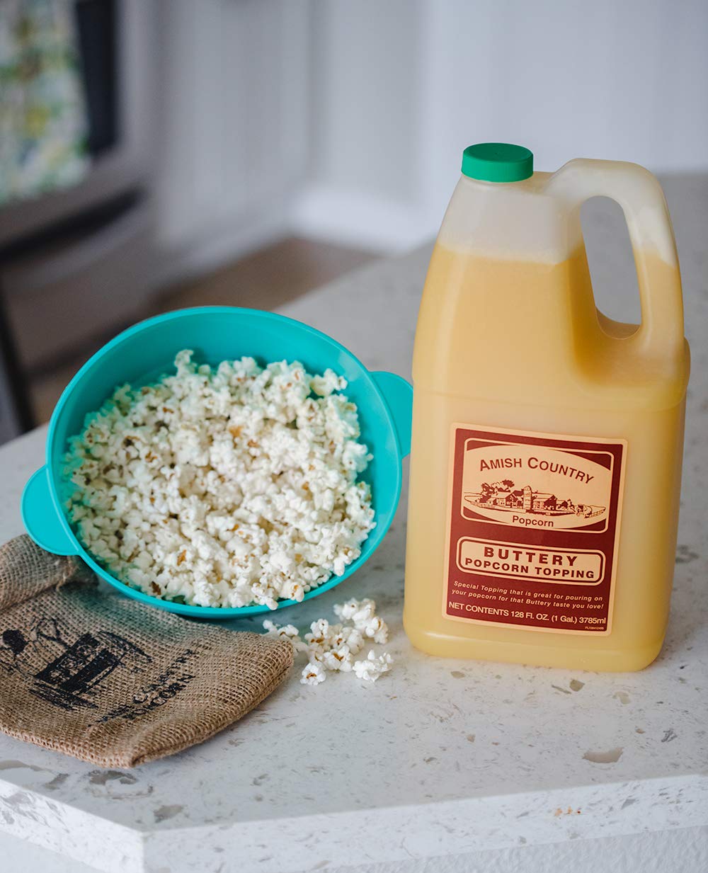 Pantry storage scene with Amish Country Popcorn Buttery Topping ready for family snacking.