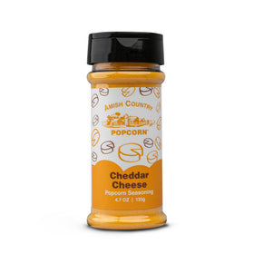 Amish Country Popcorn cheddar cheese seasoning closeup highlights bold popcorn flavor