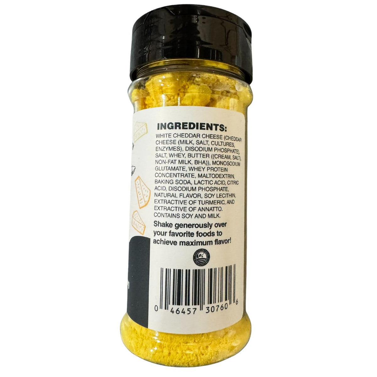 Amish Country Popcorn cheddar seasoning granules close-up.