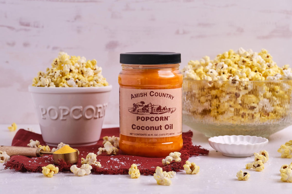 Amish Country Popcorn coconut oil jar close-up highlighting coconut-based flavor.