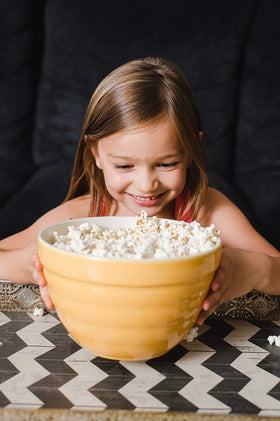 Amish Country Popcorn gourmet kernels in a 2lb bag, perfect for homemade popcorn.