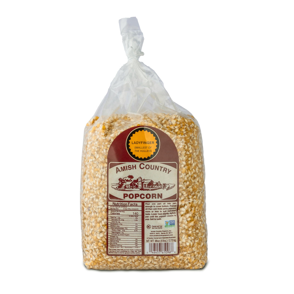 Amish Country Popcorn Ladyfinger kernels in a 6 lb bag for hulless, tender popcorn.