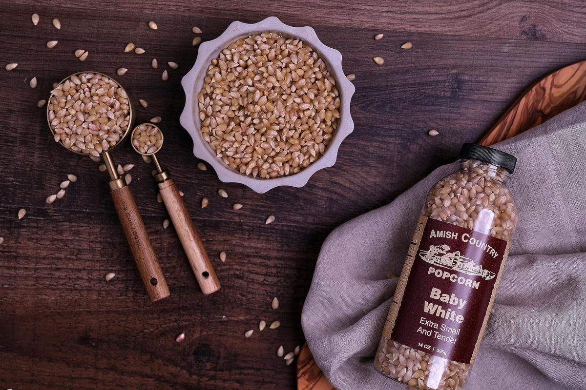 Amish Country Popcorn old-fashioned label evokes heritage flavor for gourmet snacking.