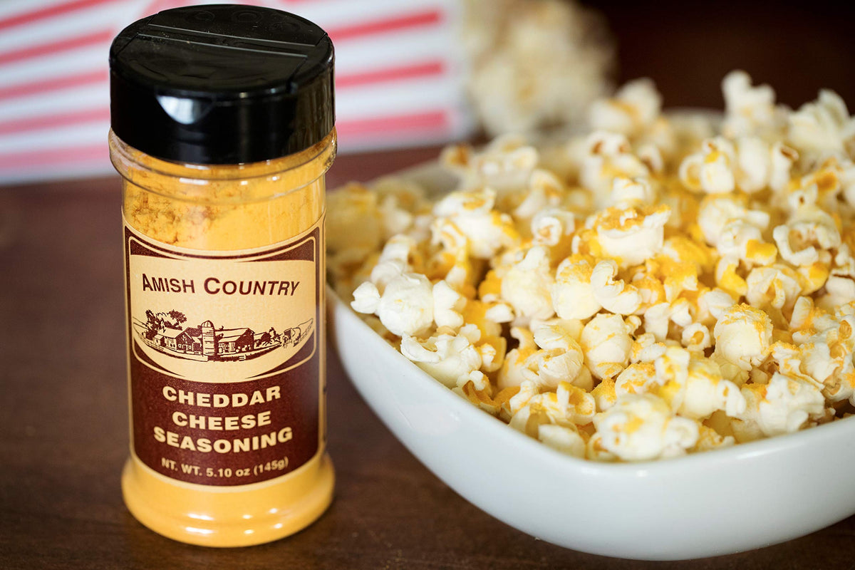 Front packaging of Amish Country Popcorn variety pack showcases flavors