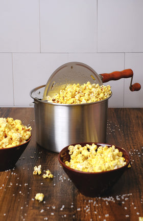 Amish Country Popcorn party setting shows colorful bowl ready for celebrations.