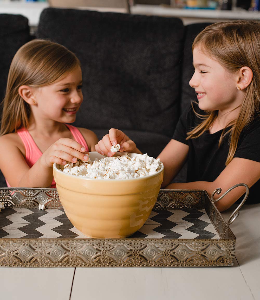 Popping kernels in a pan with Amish Country Popcorn