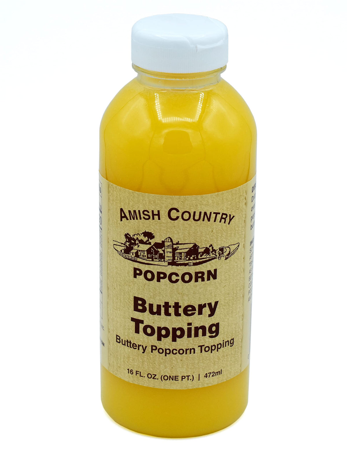 Amish Country Popcorn popcorn being poured with butter topping for a rich aroma.