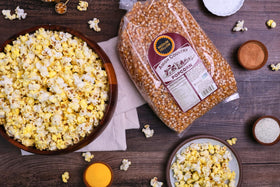Amish Country Popcorn serving idea in a bowl with friends.