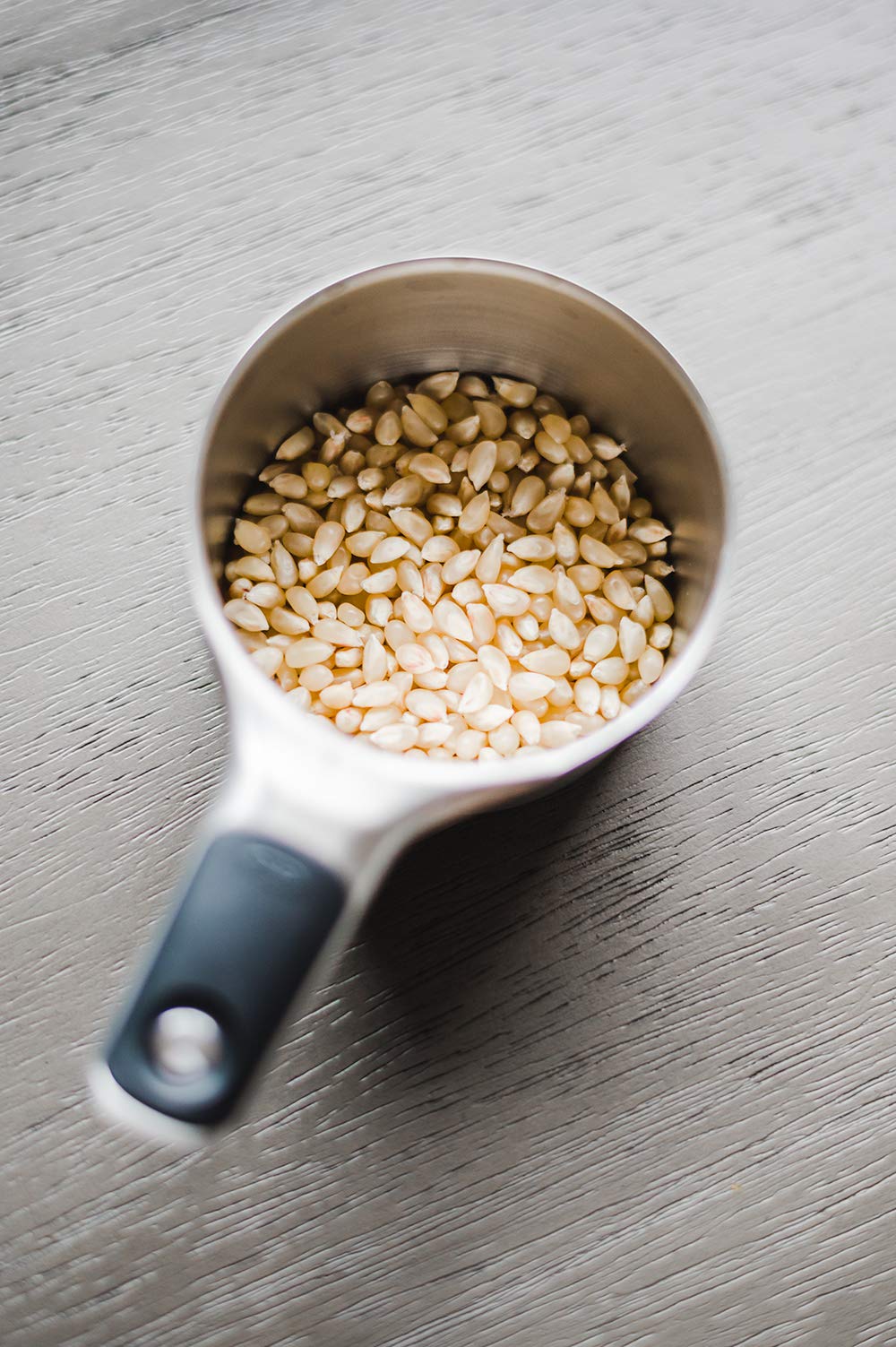 Amish Country Popcorn storage scene in jar, promotes longer pantry freshness.