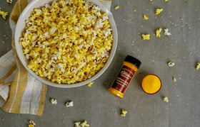 Amish Country Popcorn stored in a glass jar to preserve freshness.