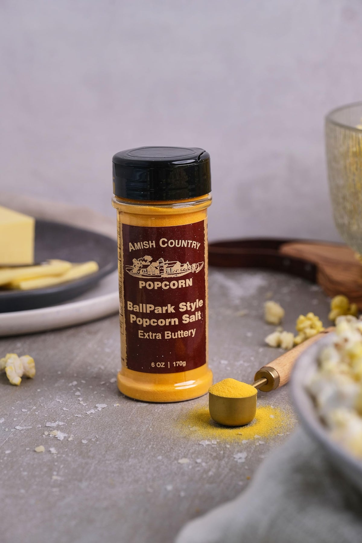 Amish Country Popcorn White Cheddar Cheese jar highlights bold flavor.