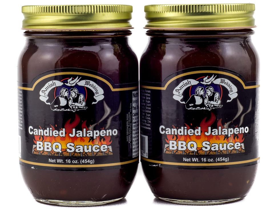 Amish Wedding Candied Jalapeño BBQ Sauce bottle on wood adds smoky sweetness