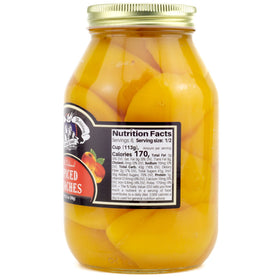 Amish Wedding peach halves close-up, rich texture and natural color.
