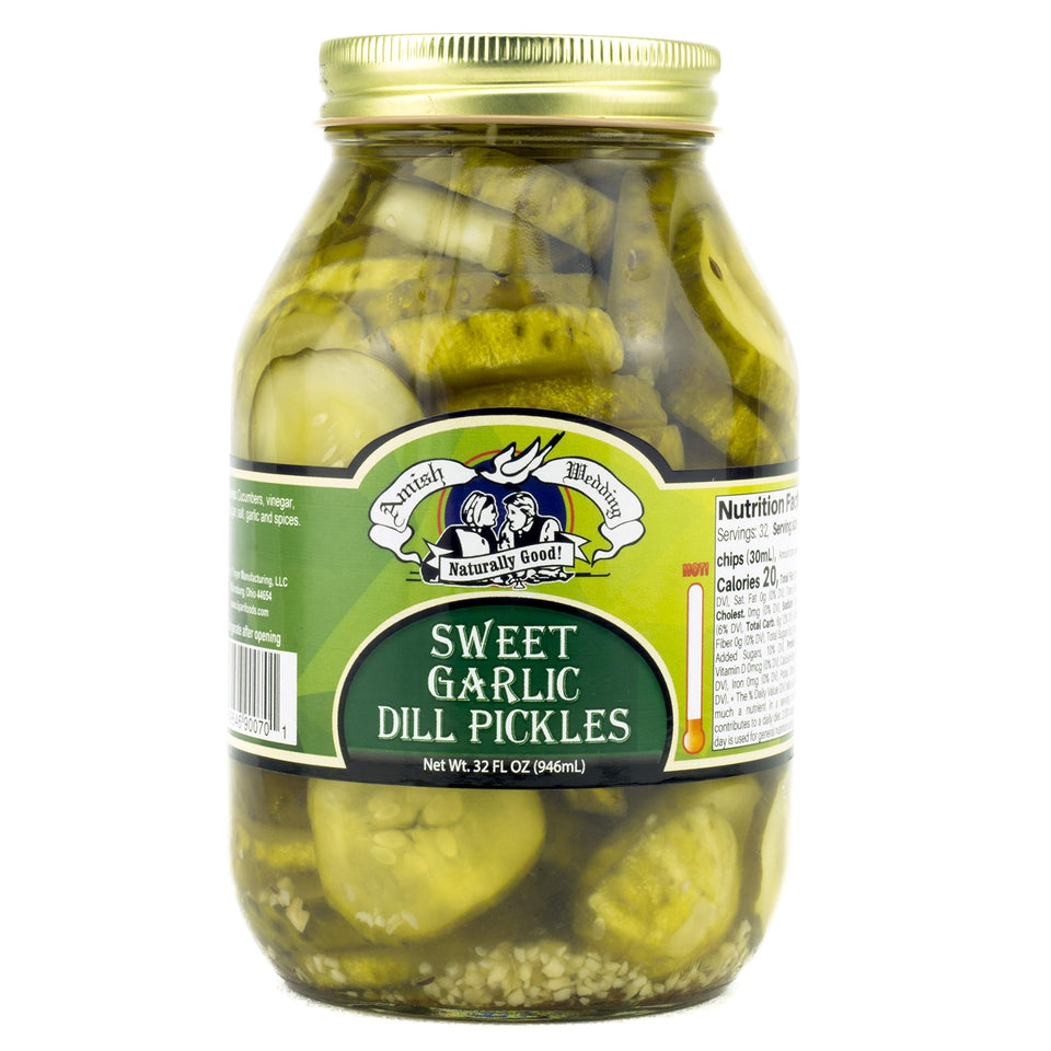 Amish Wedding Sweet Garlic Dill Pickles in a glass jar ready to enjoy.