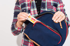 Amki Sesame Thins Classic in a lunchbox, gluten-free snack on the go.
