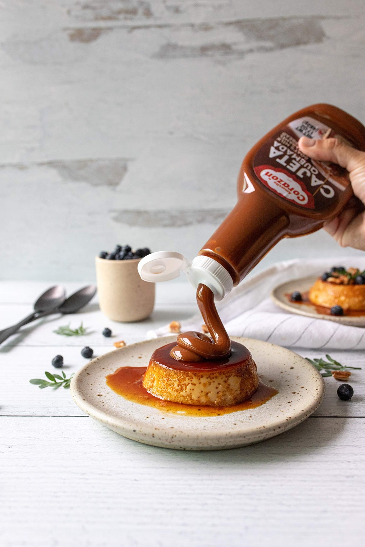 Amorcito Corazón cajeta spread jar closeup highlights smooth caramel for toppings.