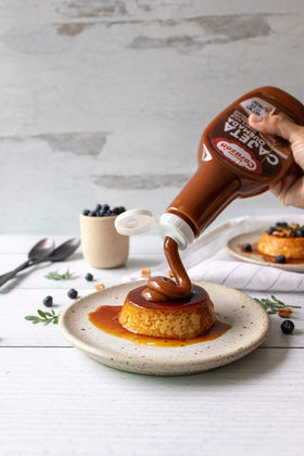 Amorcito Corazón cajeta spread jar closeup highlights smooth caramel for toppings.