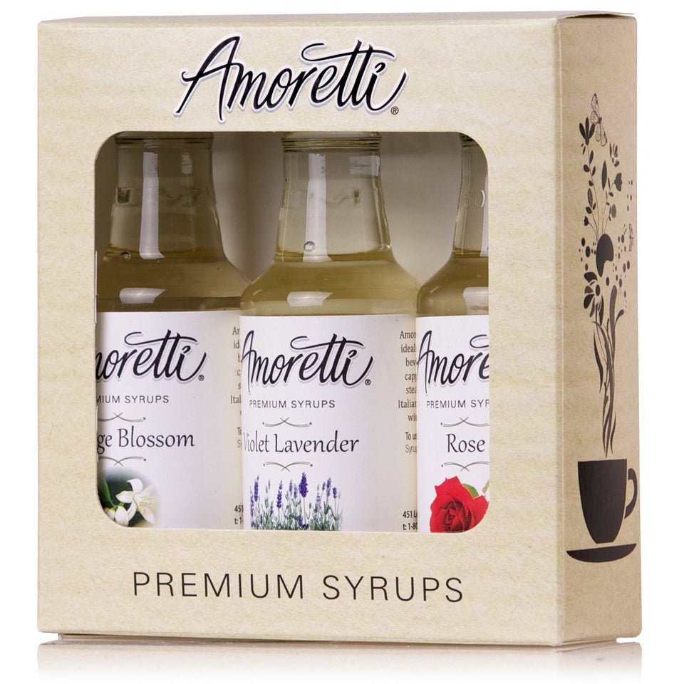 Amoretti Rose floral syrup bottle in a kitchen setting, ideal for baking and beverages.