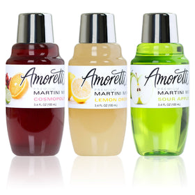 Amoretti Premium Martini Mix Cosmopolitan bottle pour, enriching home cocktails with bold flavor.