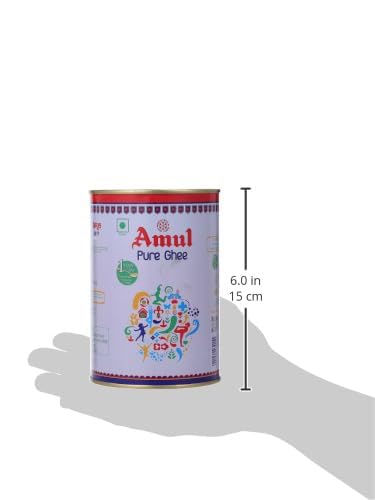 AMUL Pure Ghee in pan, adds rich, nutty flavor to dishes.